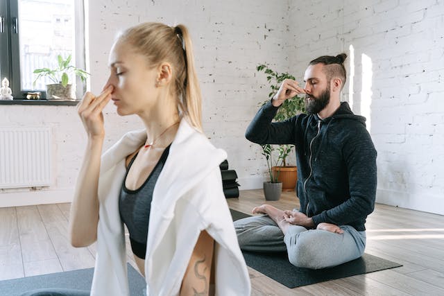 Relaxed shoulders during a slow exhale